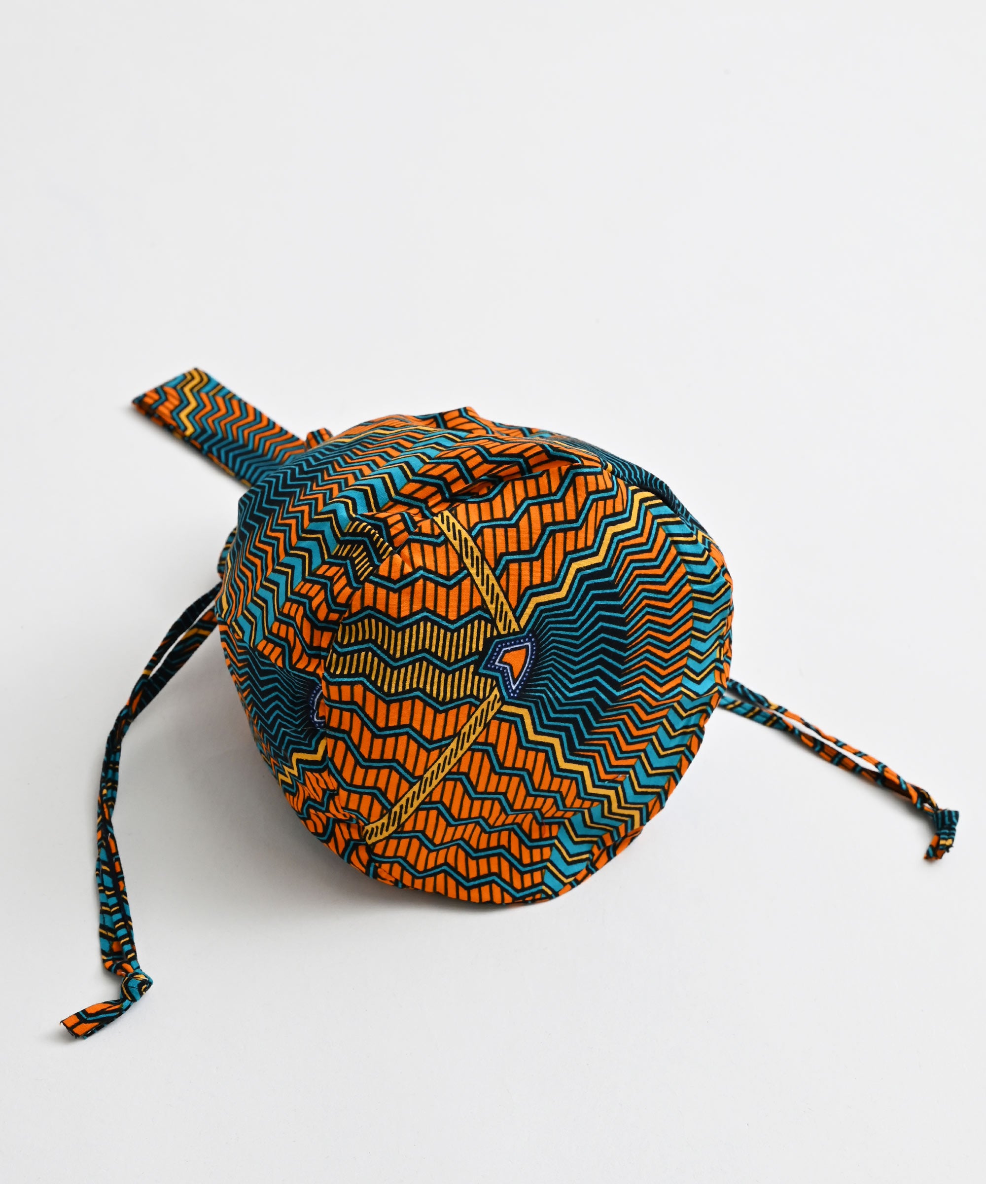 AFRICANSQUARE】パーニュ 巾着バッグ 丸底 ワンハンドル ウェーブ